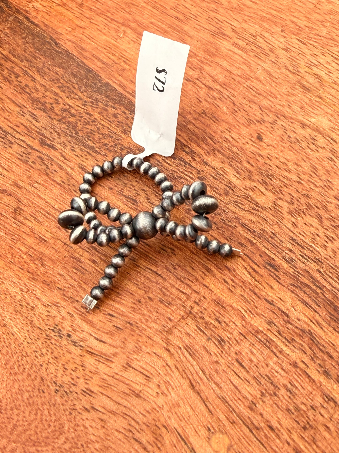 Sterling silver pearl bow stretch ring